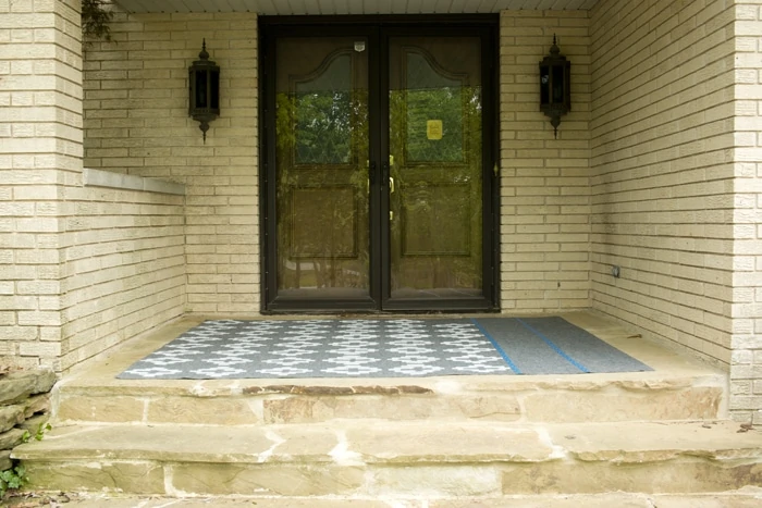 Yellow brick and double front doors picture of 