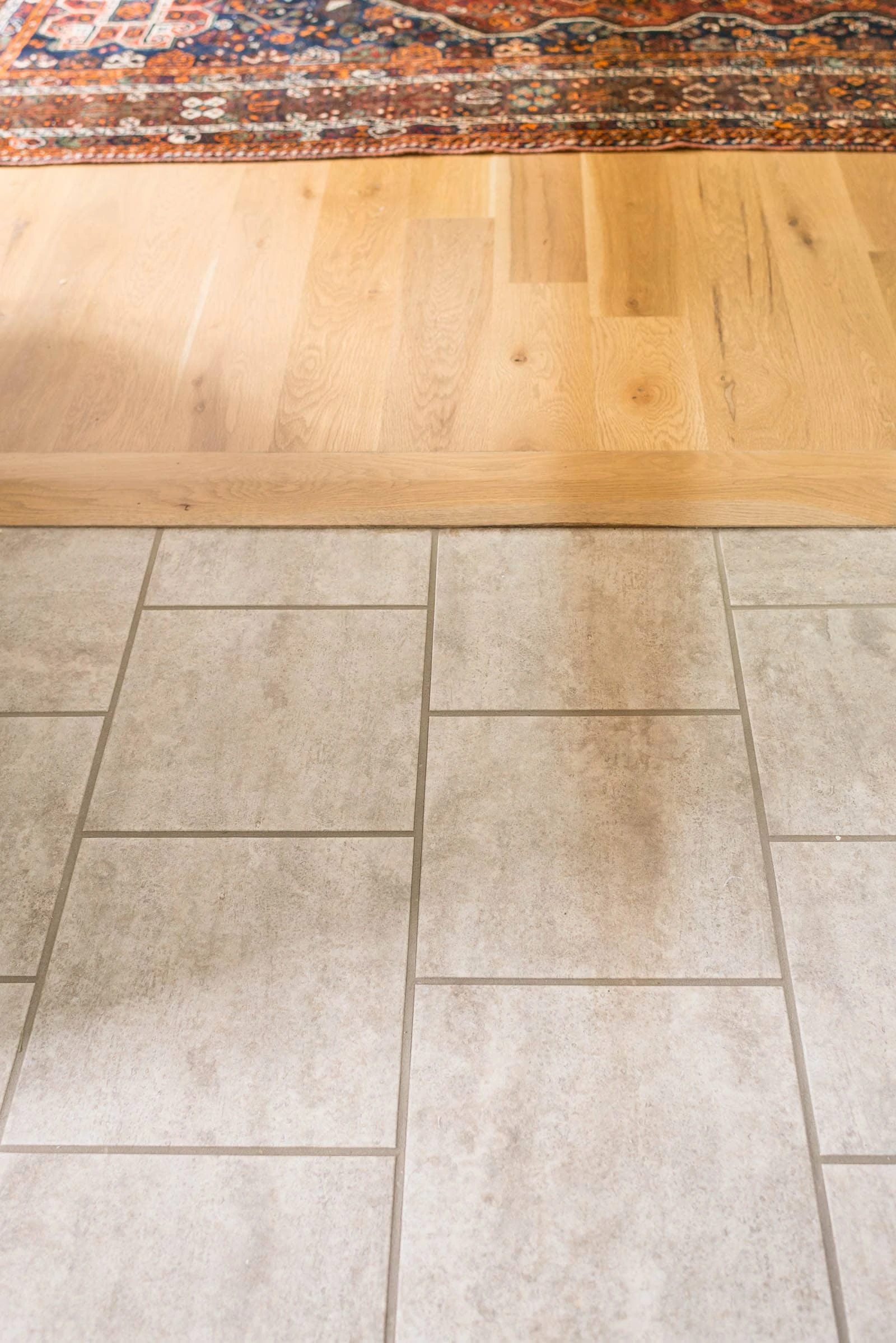 Peel and stick vinyl floor tile transition 