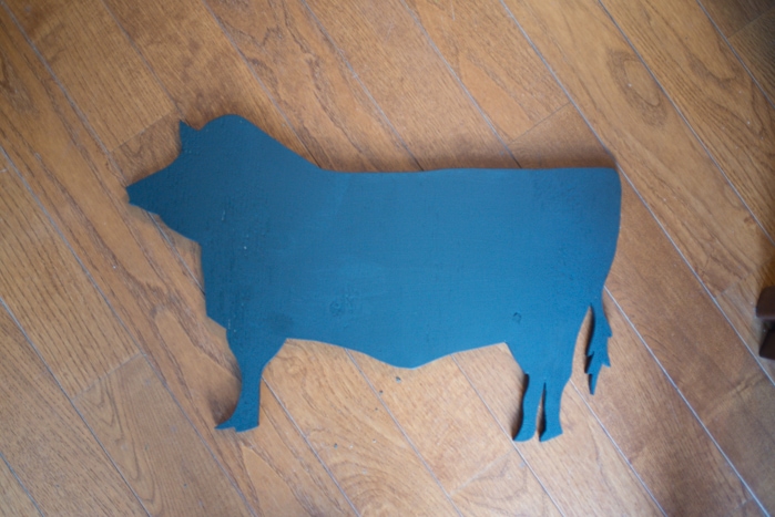 After sanding use chalkboard paint on cow