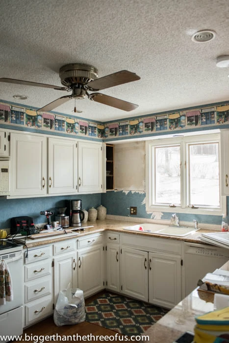 Taking a cabinet off the wall