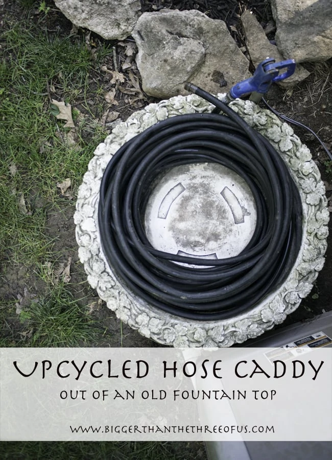 make a hose caddy out of an old fountain top