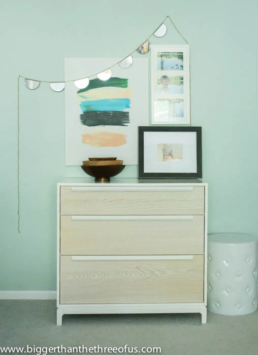 Bedroom dresser styling with wood pieces