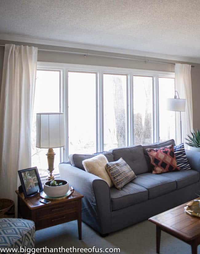 large living room window with curtains