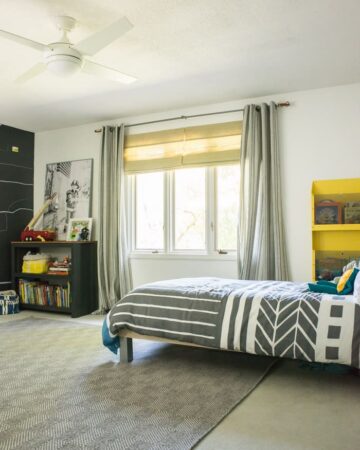 Want a room that can grown with your kids? Check out this modern and bright boys room.