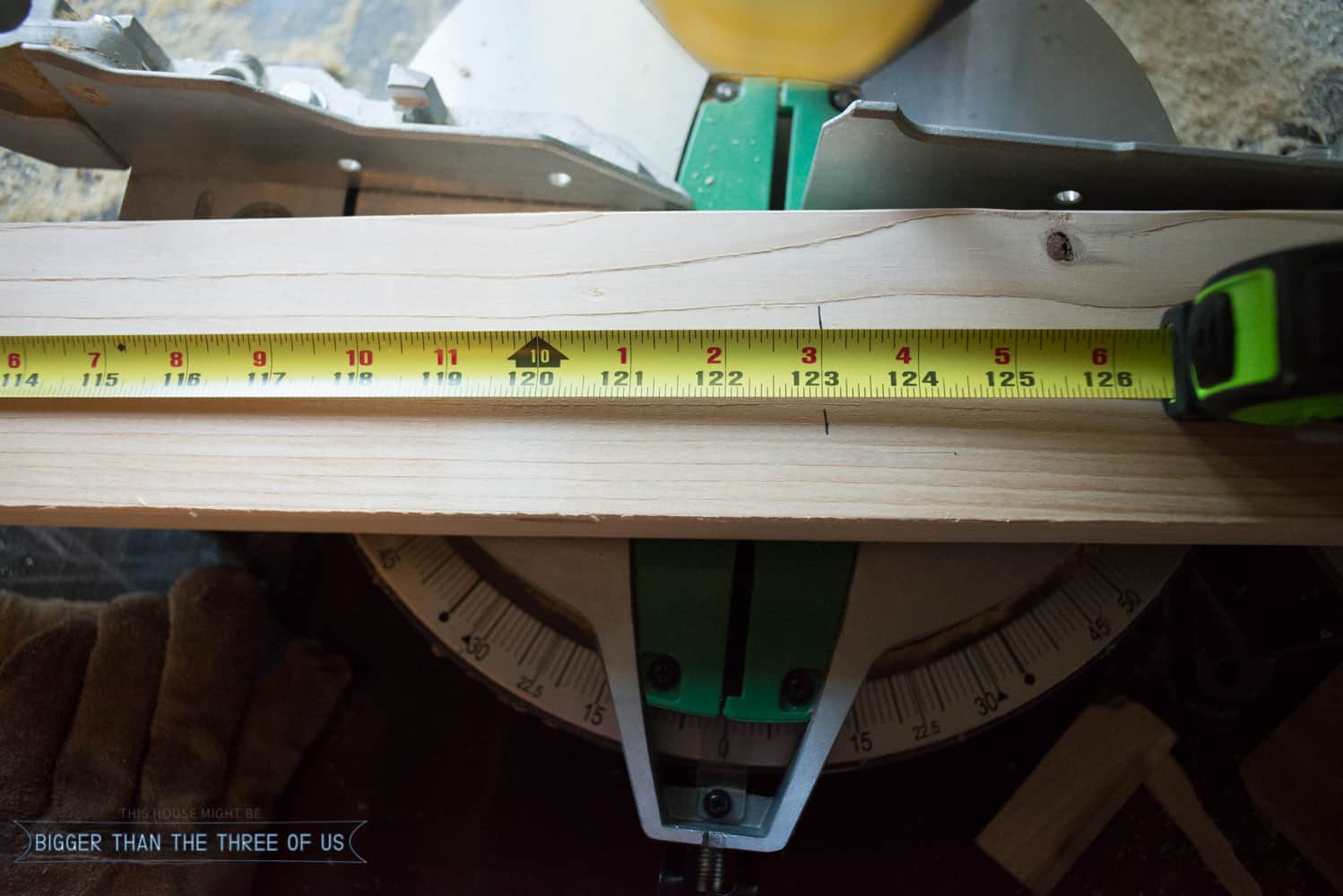 Cutting 2x4's on miter saw for upholstery project