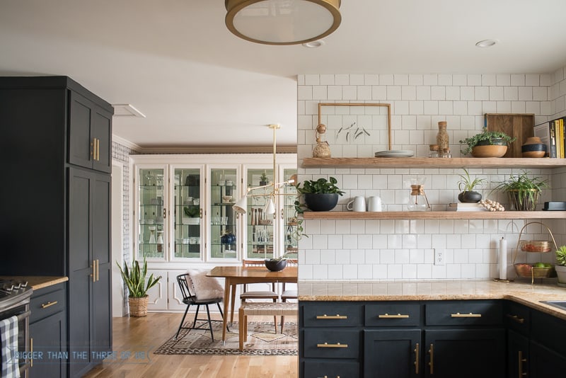 Kitchen Reveal with Dark Cabinets and Open Shelving