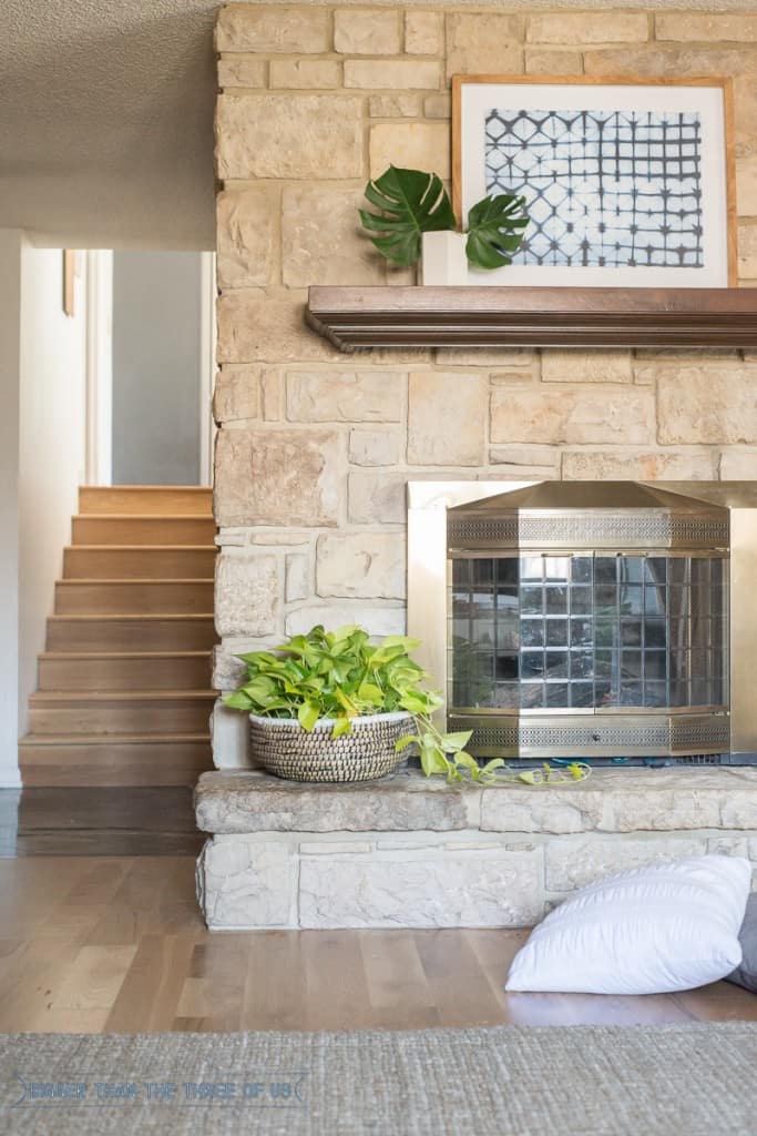 Stacked stone with mantle in playroom