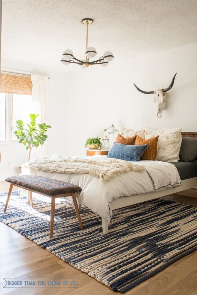 Check out this Mid-Century Bedroom. It has a DIY vintage mid-century bench, and eclectic but minimal touches throughout! 