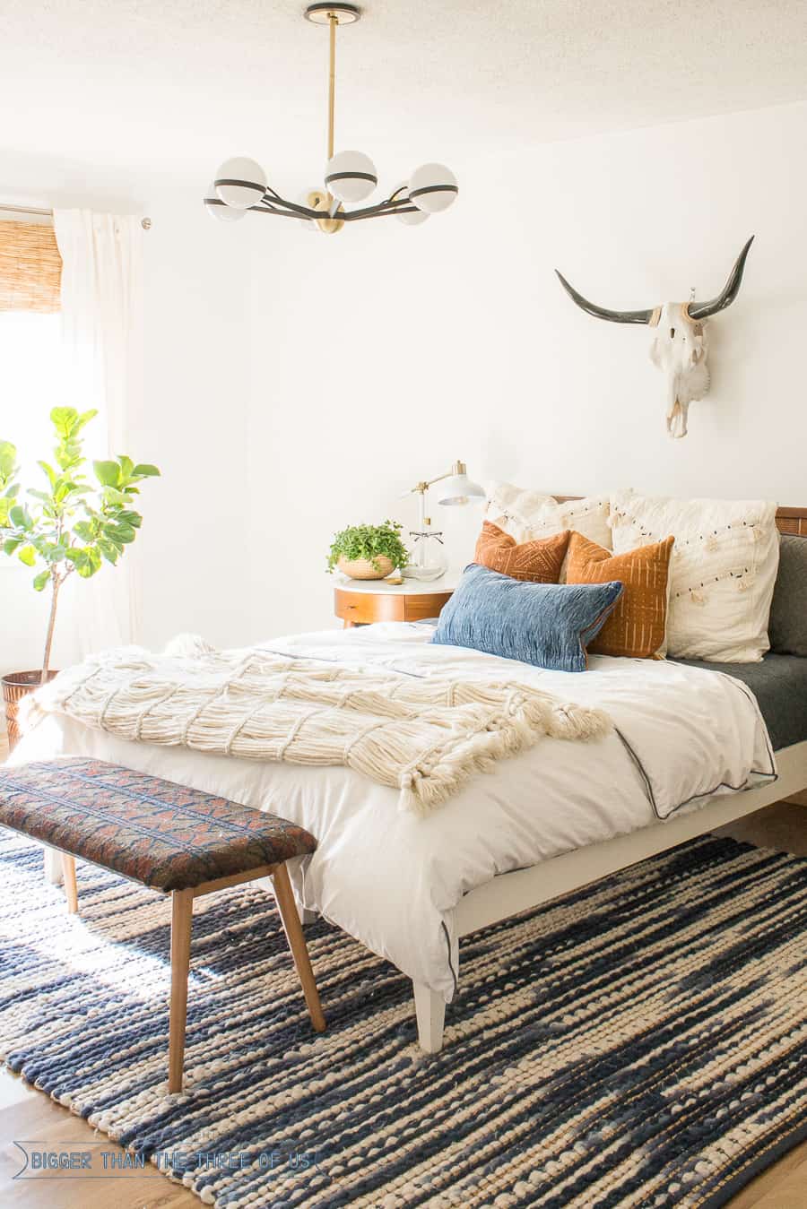 Light and Bright bedroom with mid-century vintage furniture