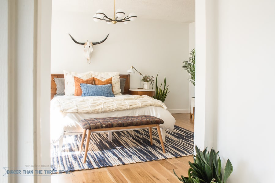 Check out this Mid-Century Bedroom. It has a DIY vintage mid-century bench, and eclectic but minimal touches throughout! 