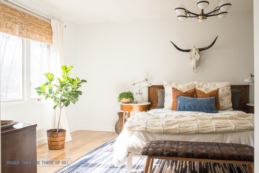 Check out this Mid-Century Bedroom. It has a DIY vintage mid-century bench and lots of plants.