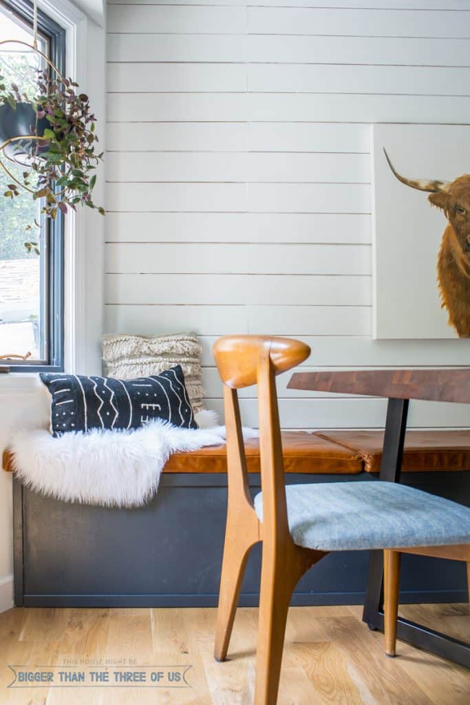 Updated Eat-In Kitchen with Leather Bench Seat, Highland Cow Painting, shiplap and more!