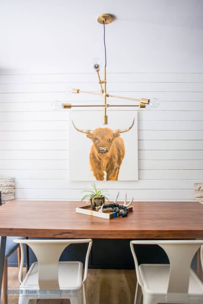 Updated Eat-In Kitchen with Leather Bench Seat, Highland Cow Painting, shiplap and more!