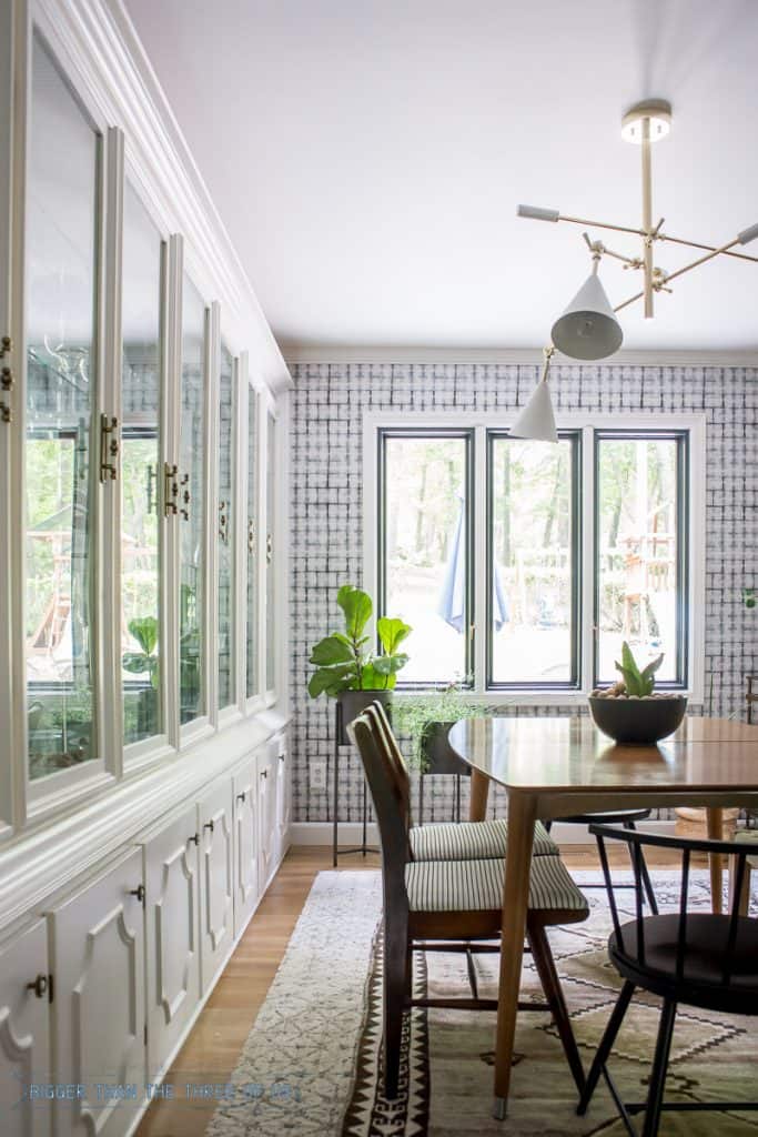 Built-in China Cabinet in Dining Room with Mid-Century furniture, shibori wallpaper and plants