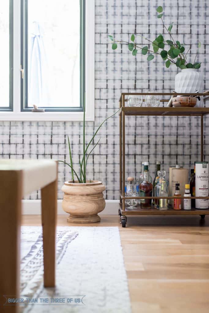 Wood planter, brass bar cart in Mid-Century Dining Room 