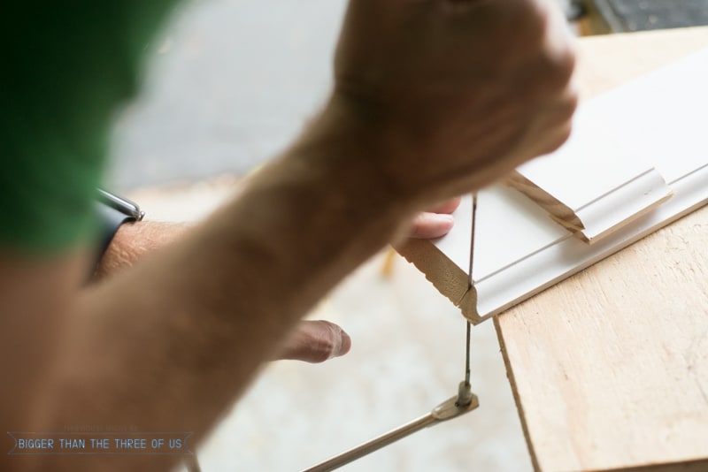 Using a coping saw on baseboard