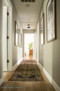 Modern Travel Gallery in Hallway - Bigger Than the Three of Us