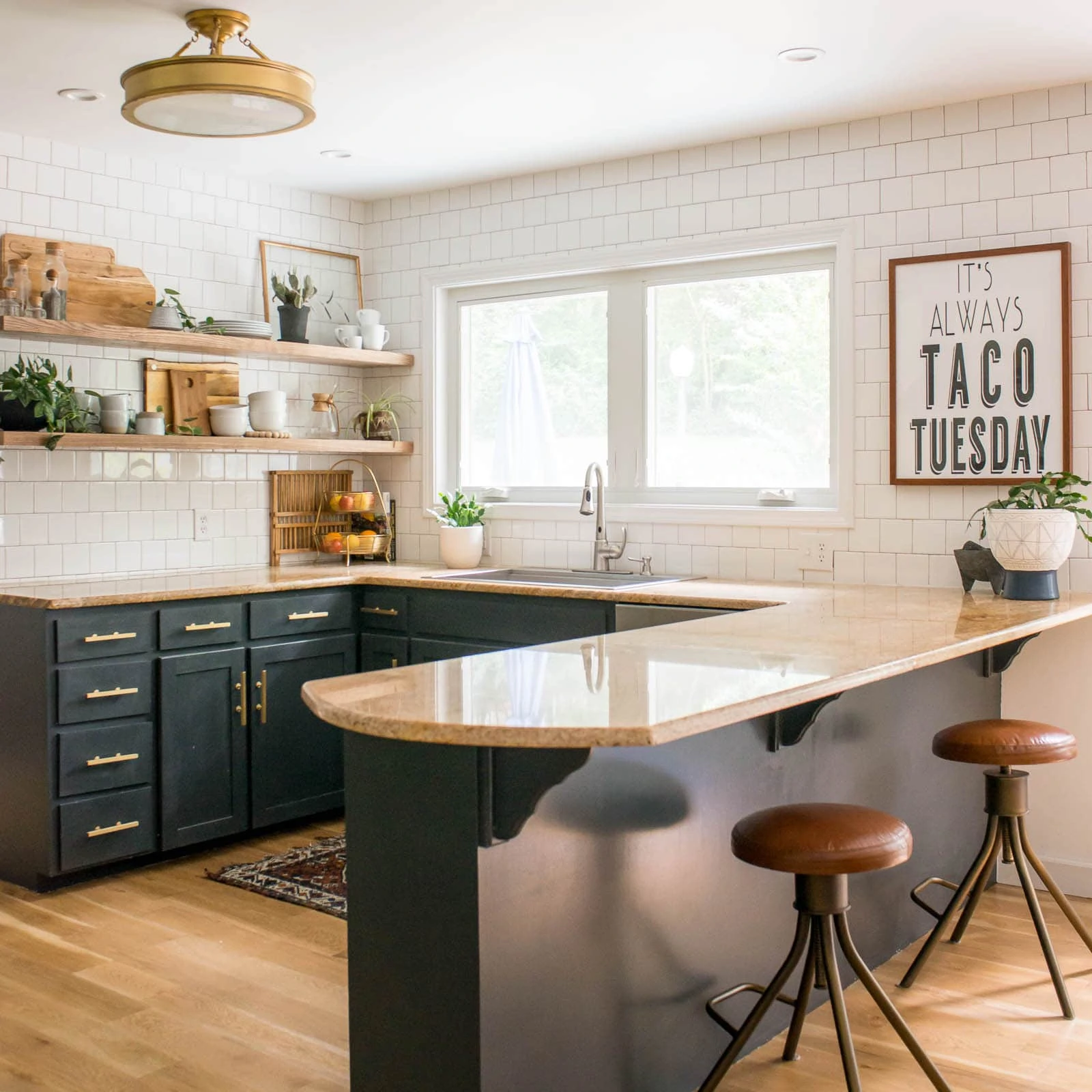 Dark painted kitchen cabinets in modern kitchen