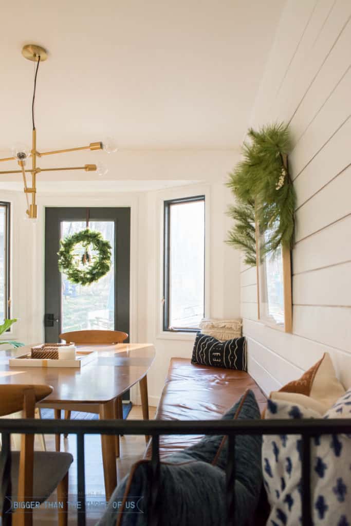 Wreath over patio door in kitchen | Modern Christmas Home Tour