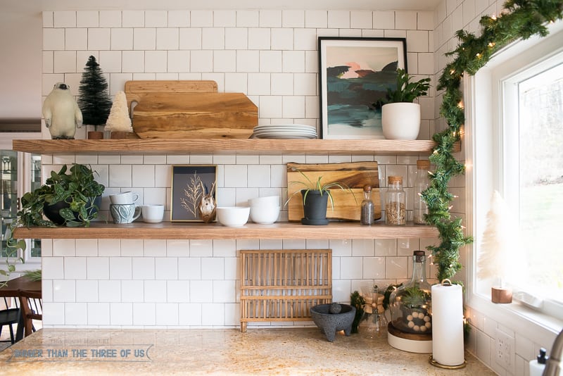 Open Shelves in the Kitchen with art and Christmas Decor