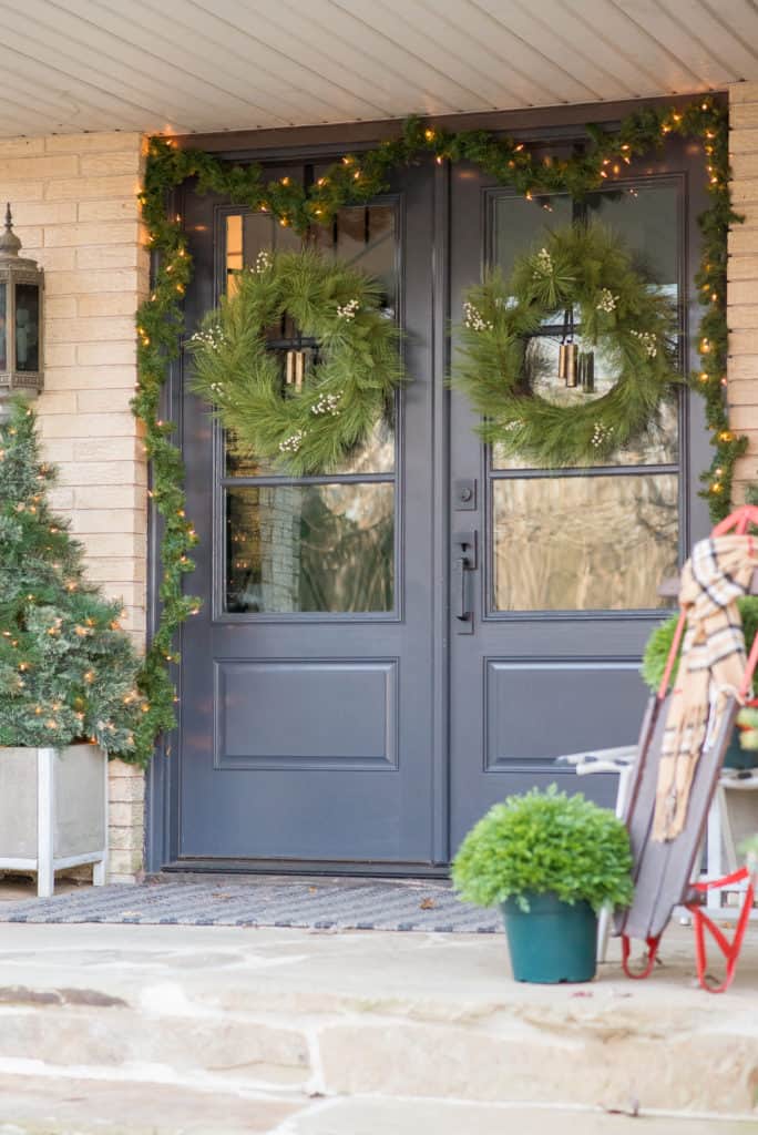 Dark Entry doors with glass decorated for Christmas