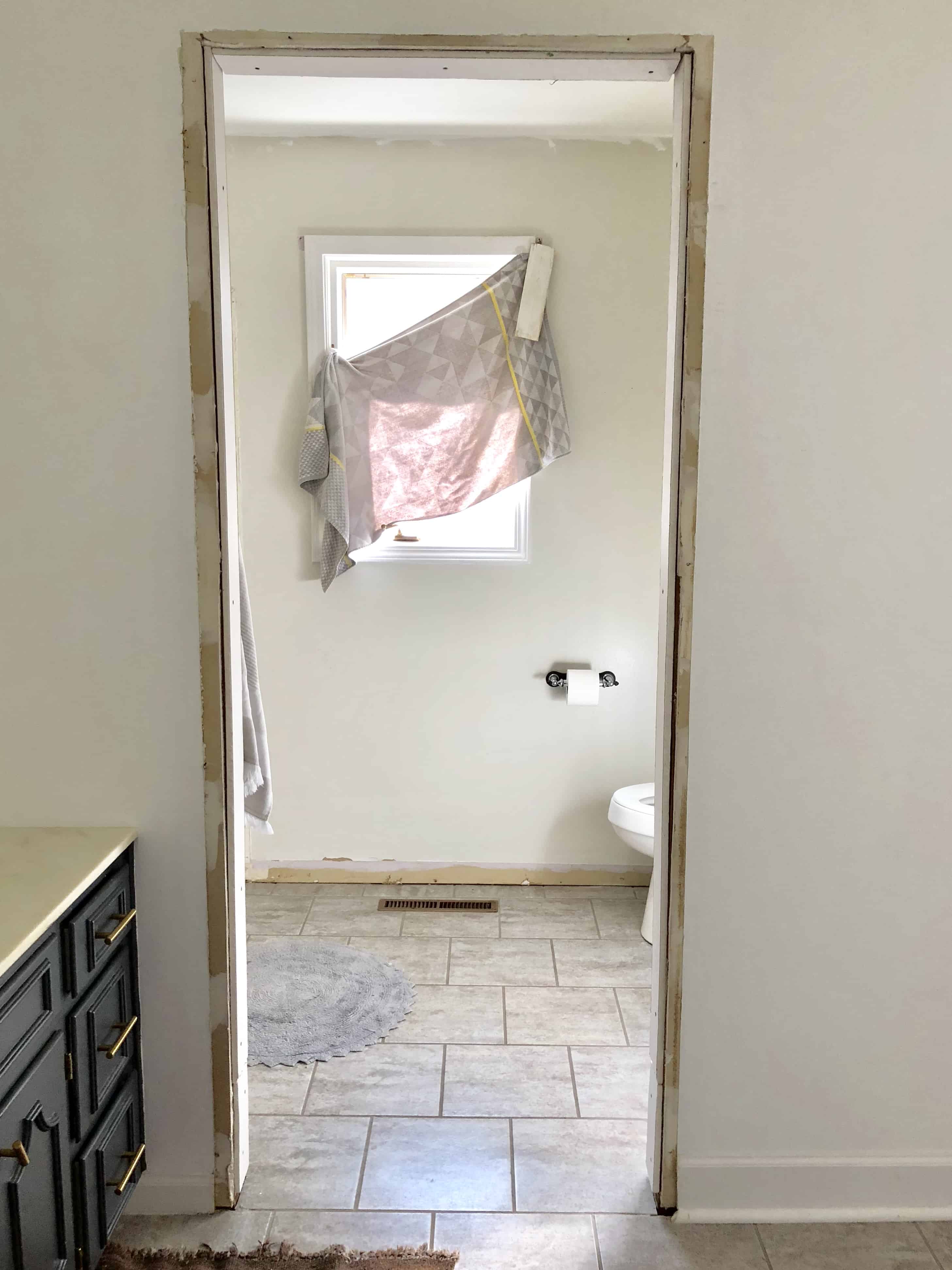 Drywall Repairs in the Small Master Bathroom Makeover