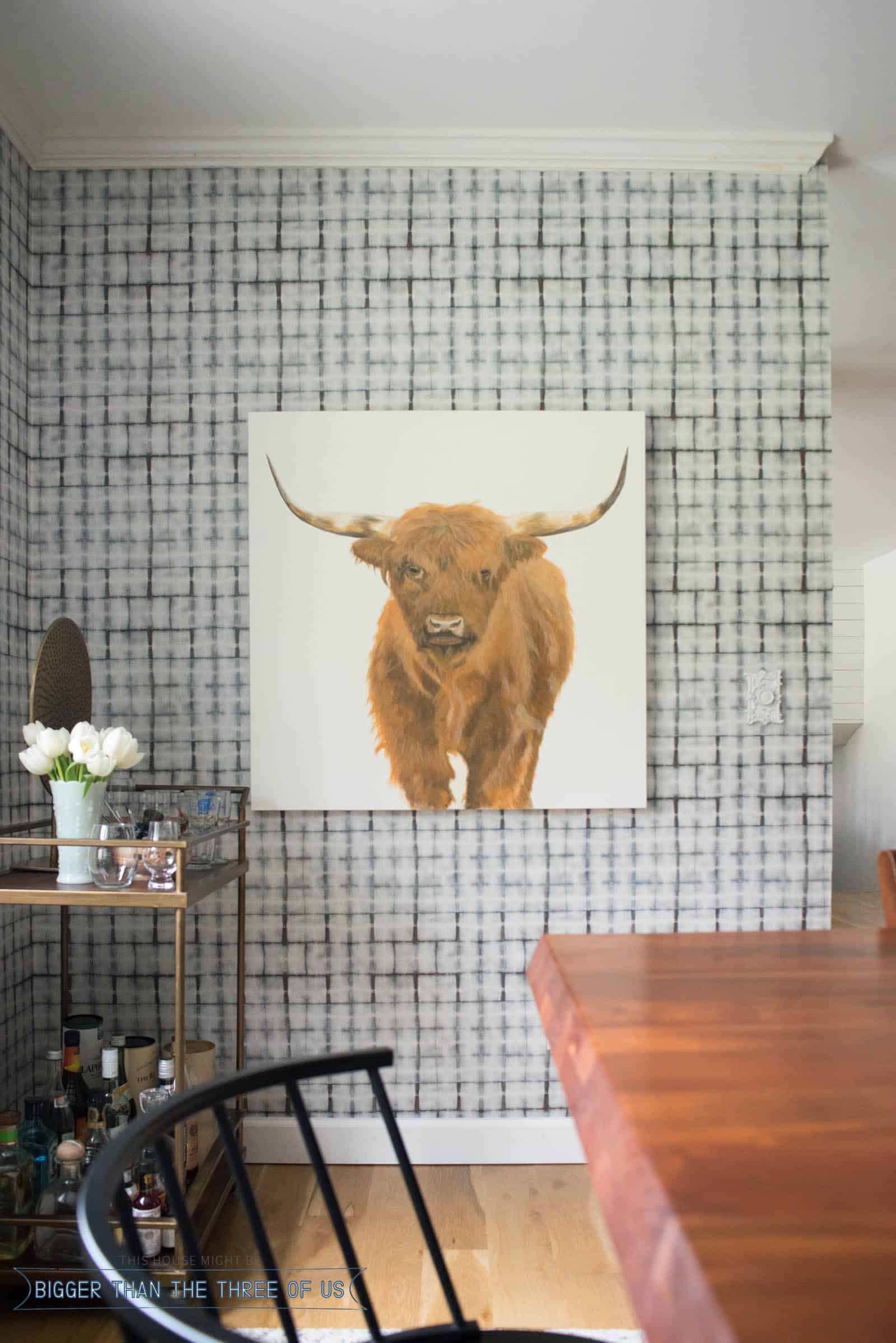 HIghland Cow Painting with a barcart in modern dining room