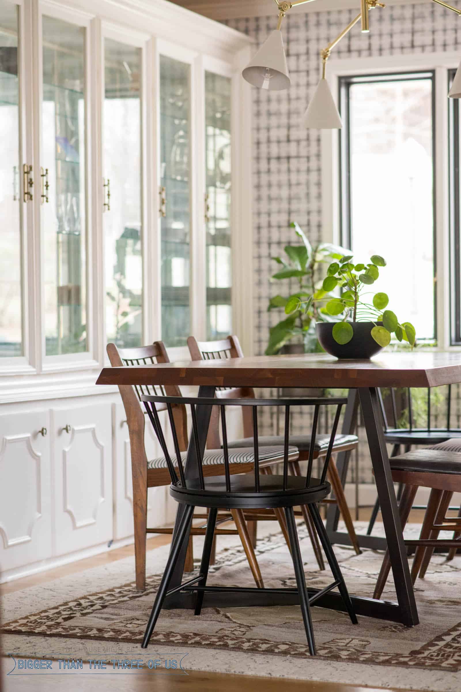 White built-in china cabinet in modern formal dining room