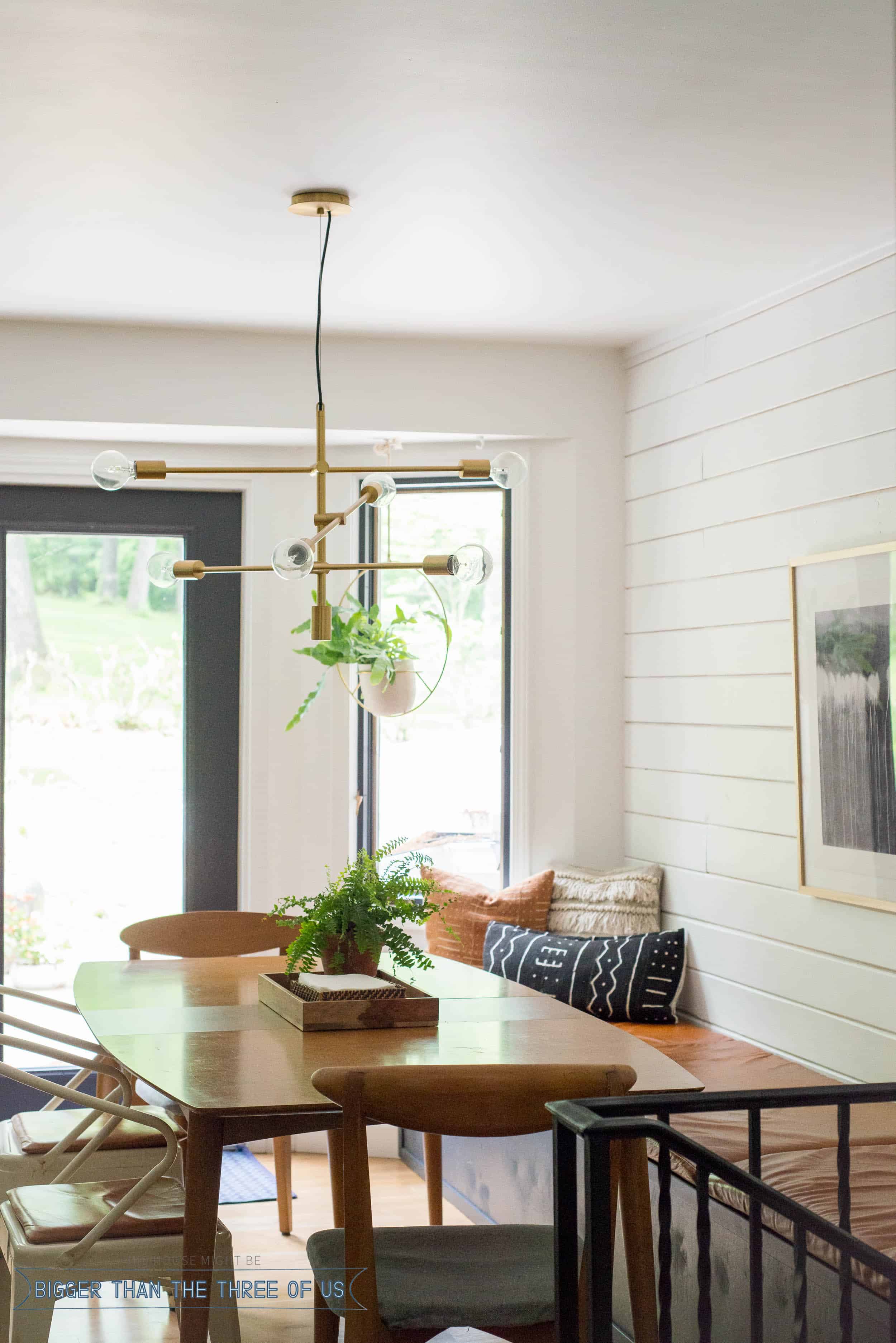 Eat In kitchen featuring a banquette and shiplap.