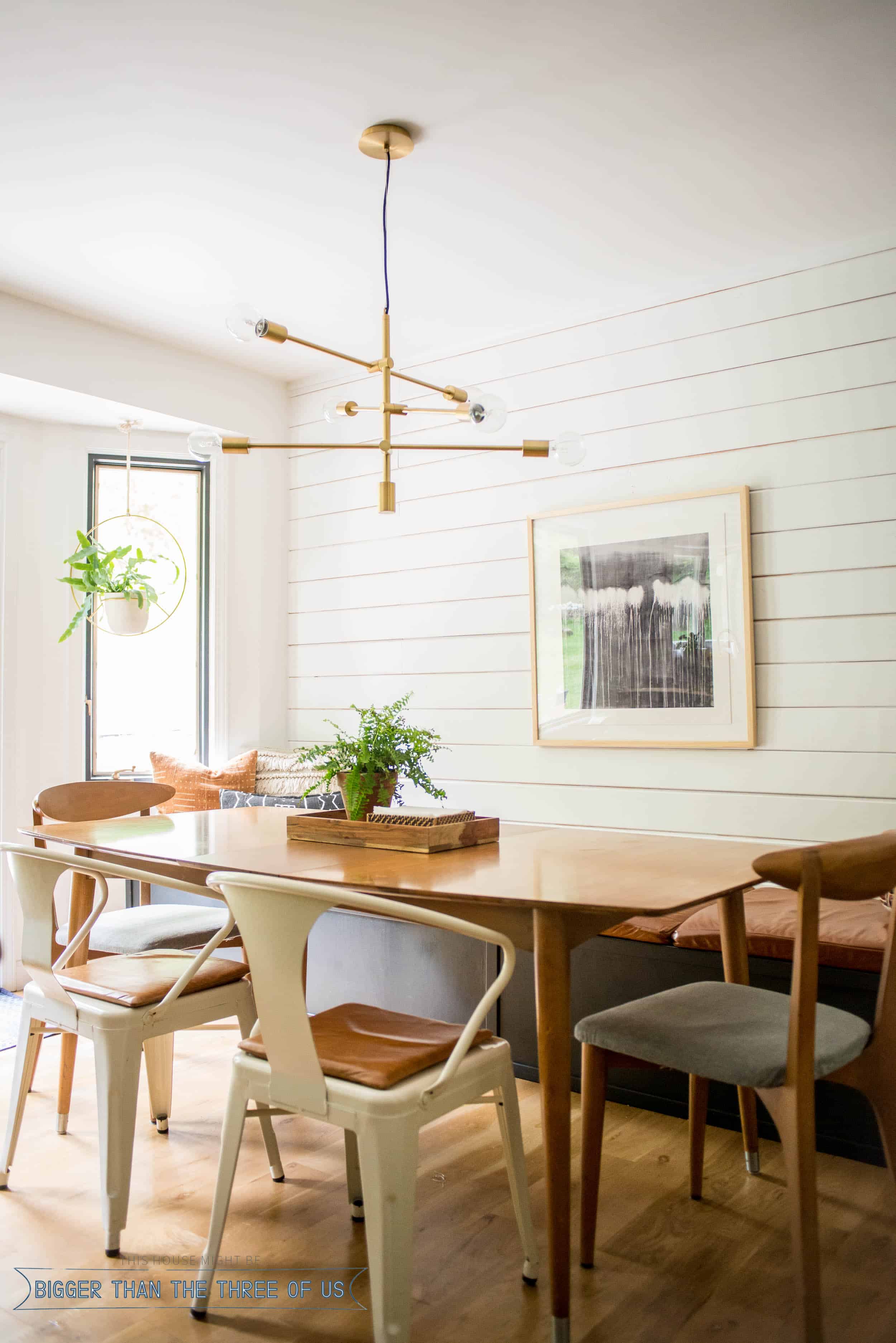 Eat In kitchen featuring a banquette and shiplap.