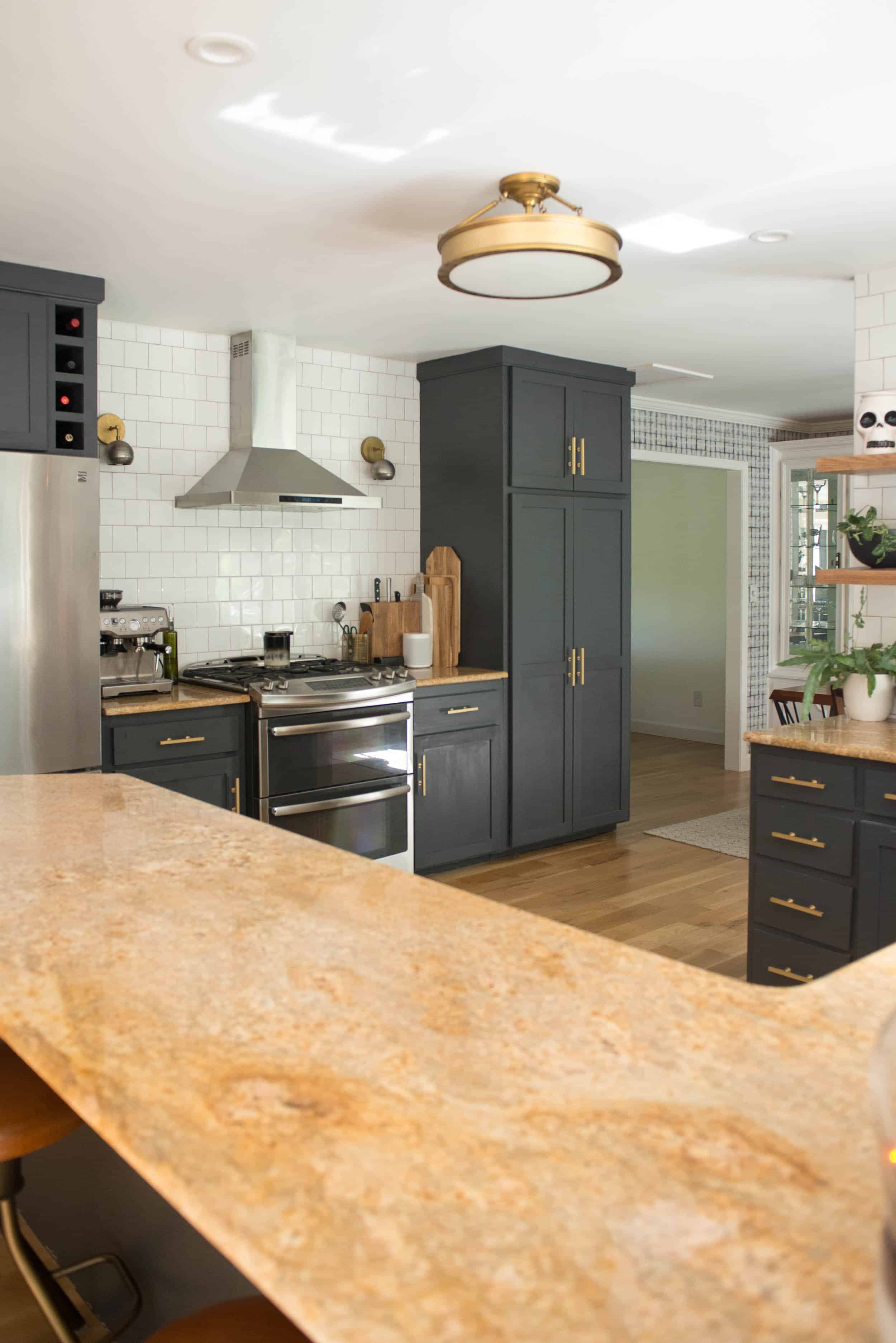 Brass and Black Kitchen with Halloween Decor