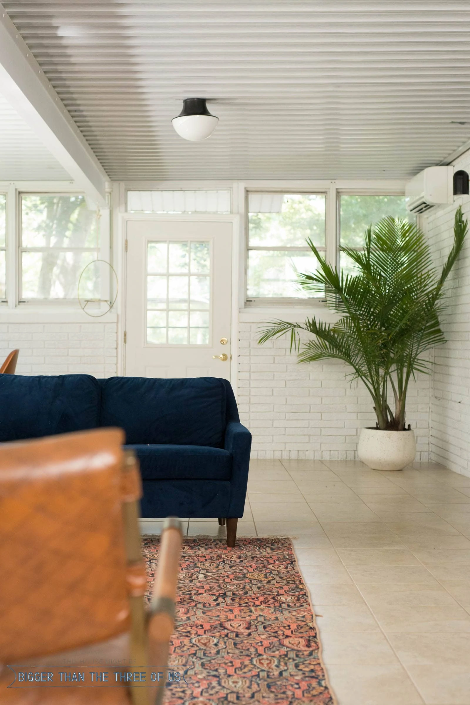 Light and Bright Sunroom Office Addition on the back of the house.