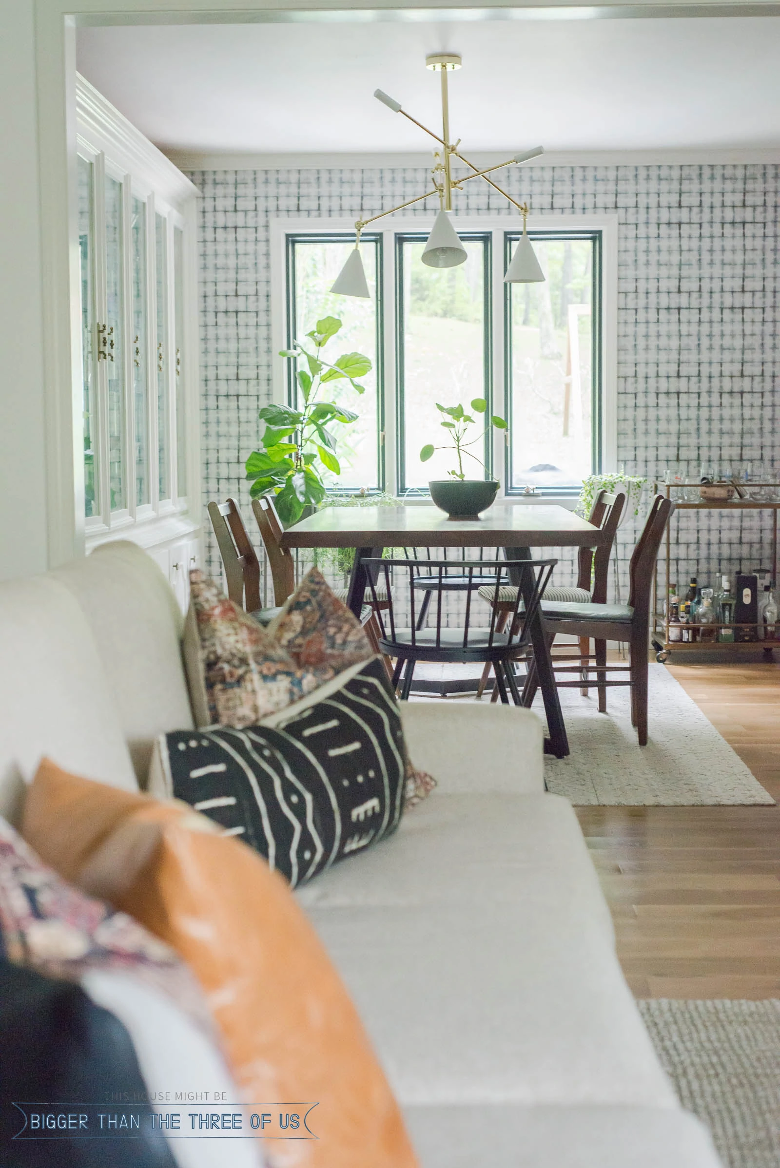 Living room that looks into formal dining space.