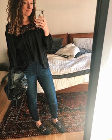 Date night outfit: jeans and slides with leather coat