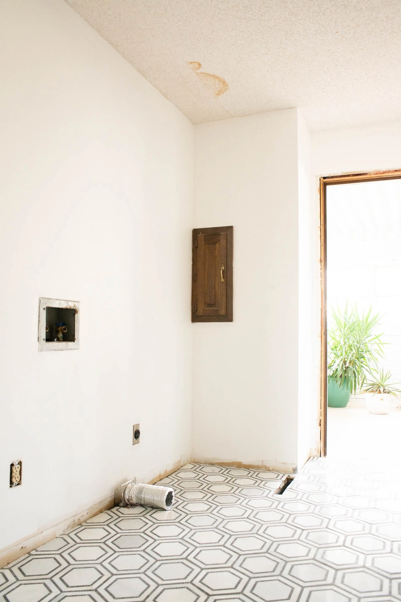 Laundry Room with hex flooring