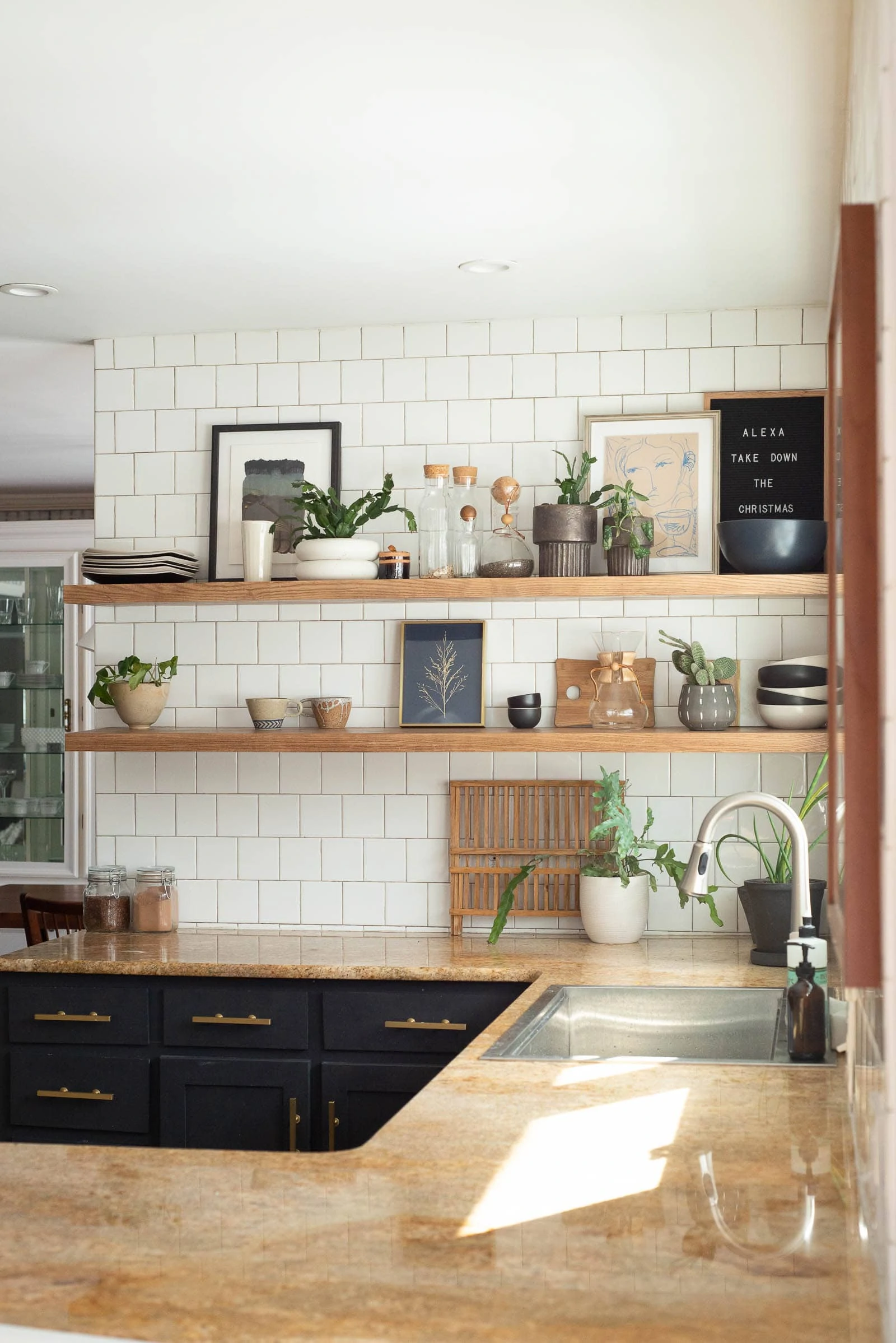 Kitchen shelves decorated with art