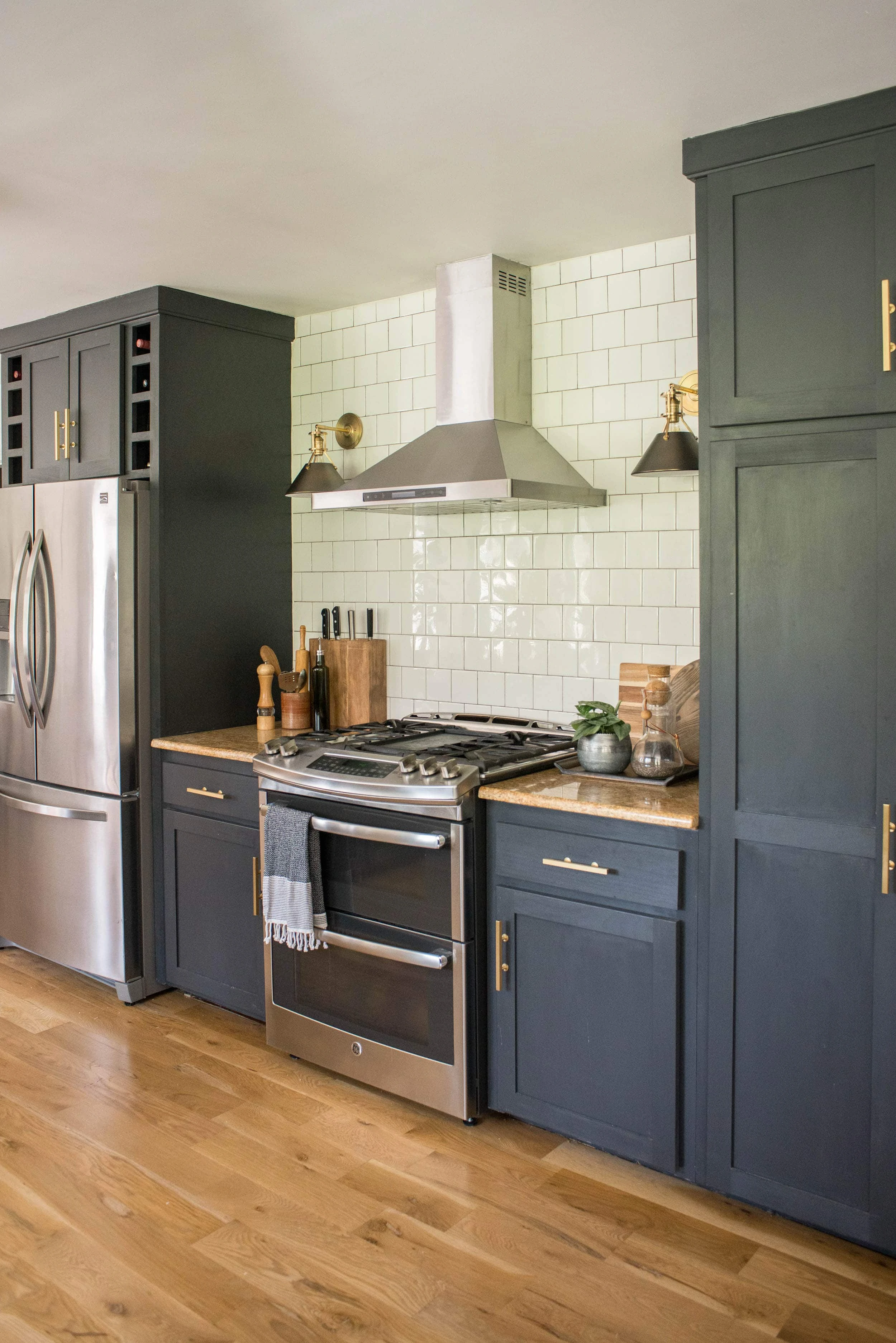 Kitchen sconce on each side of rangehood