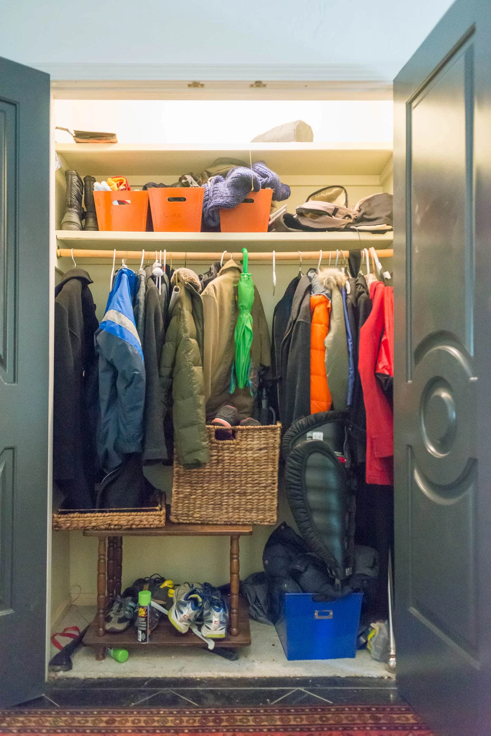 Unorganized coat closet in entry