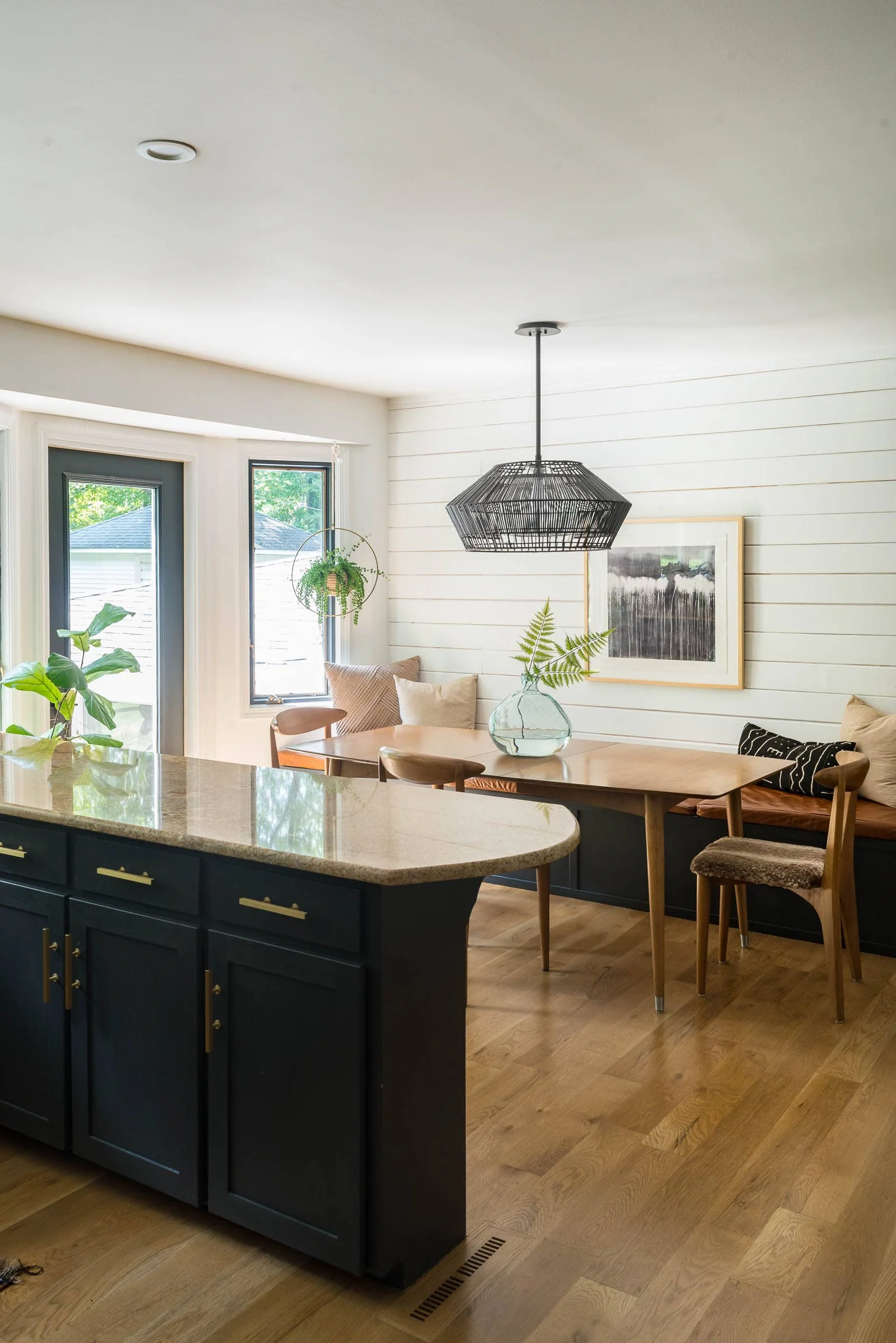 Woven light above midcentury table