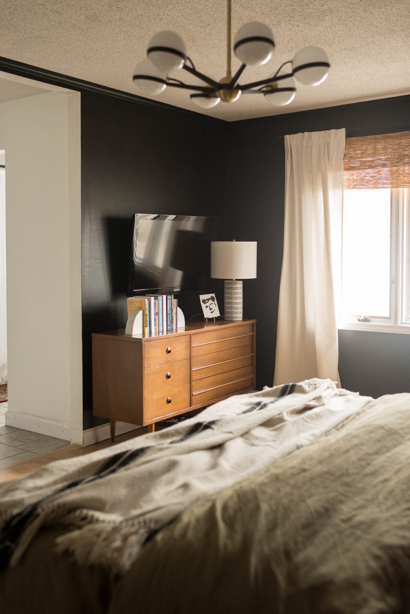 Tricorn Black Bedroom with a Midcentury Feel