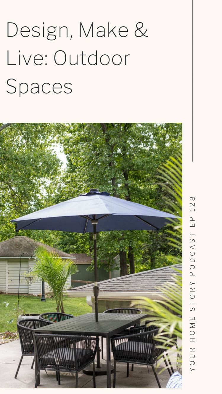 Outdoor patio space featuring a black table, blue umbrella on concrete, etc. 