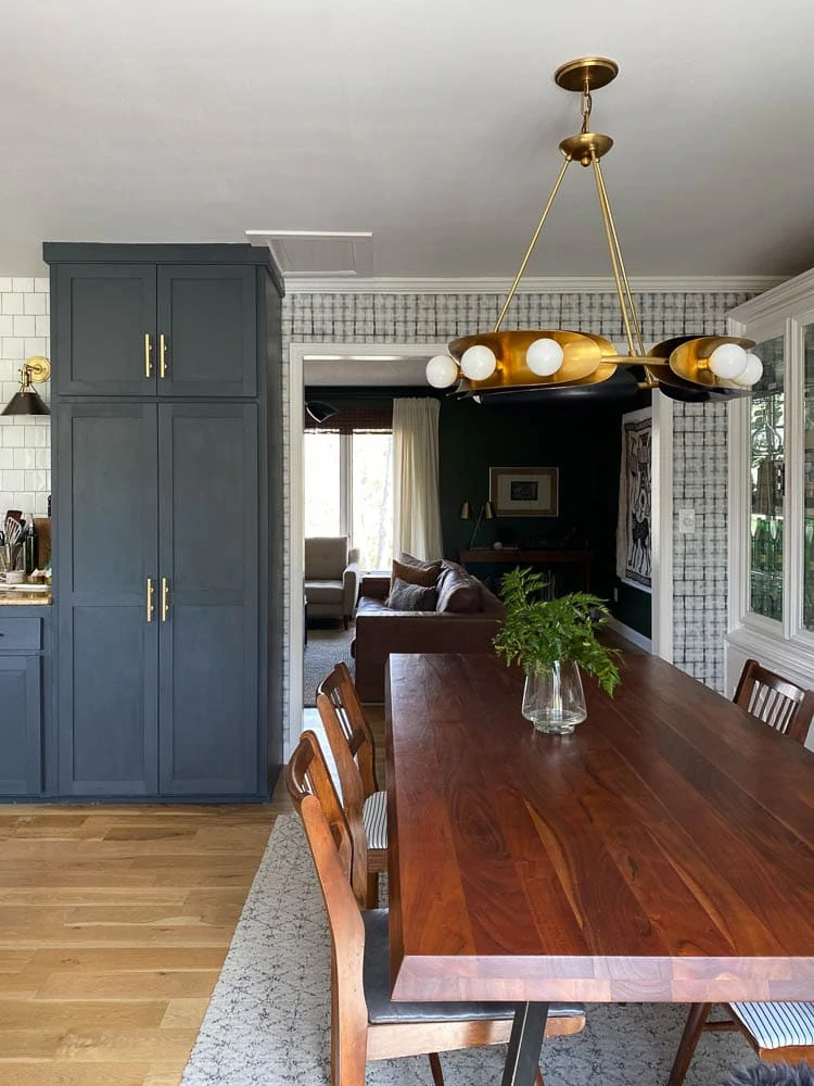 Dining table looking into living room