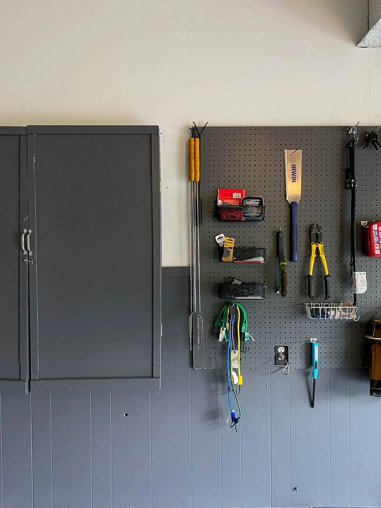 Organize household supplies showing on a peg board in garage