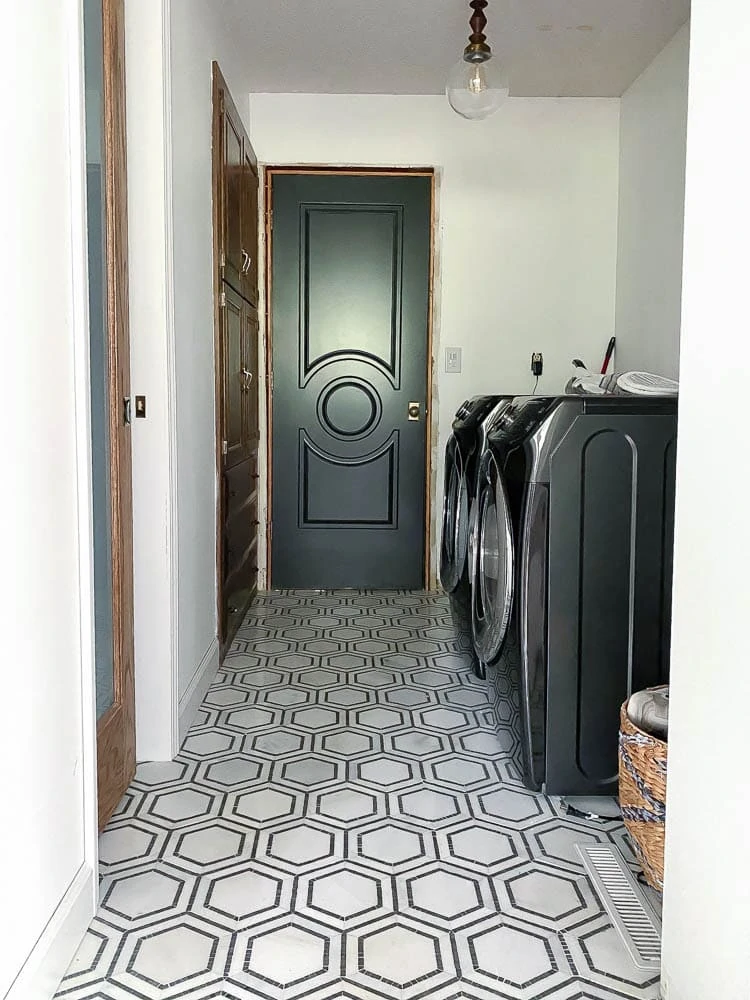 white utility room with marble hex flooring