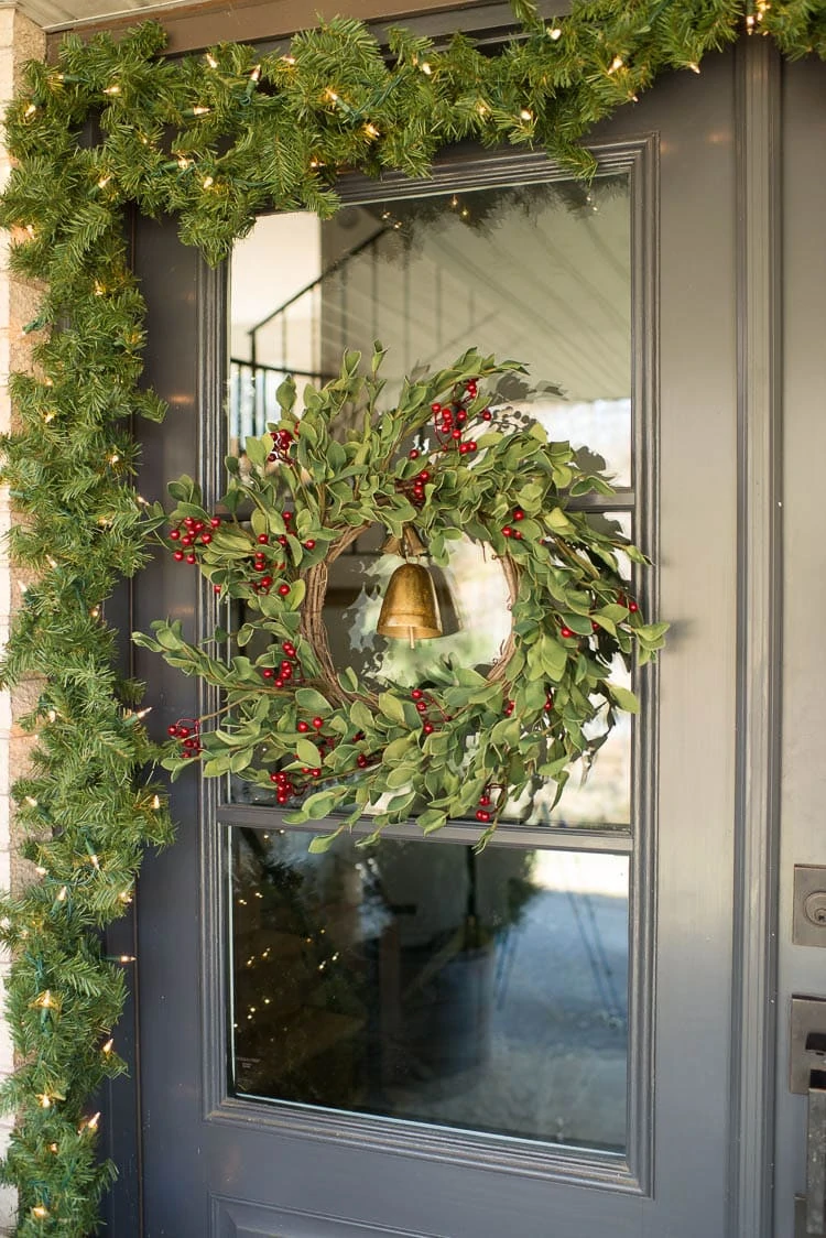 Christmas Wreath on Black door outside 