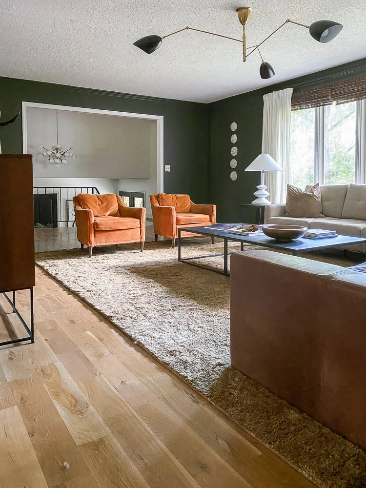 orange velvet chairs in living room