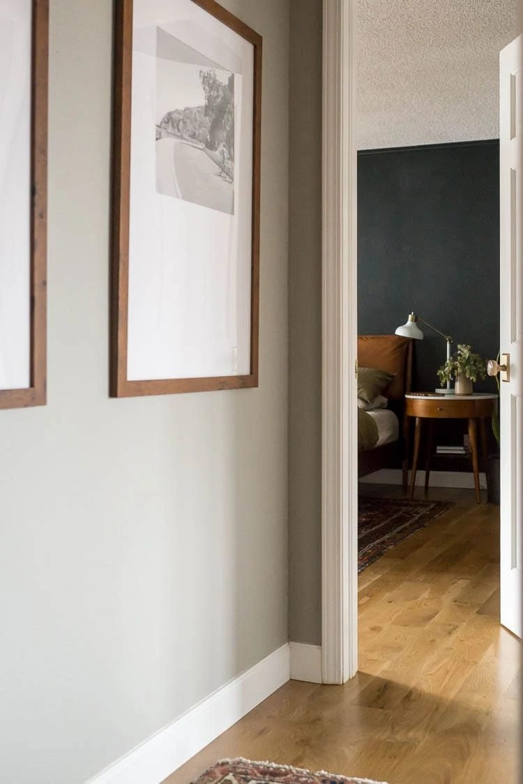 how to cope baseboards showing a hallway with a baseboard coping cut in the corner