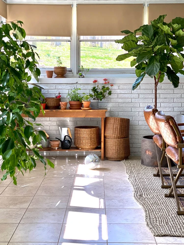 repurposed potting bench with storage in sunroom 