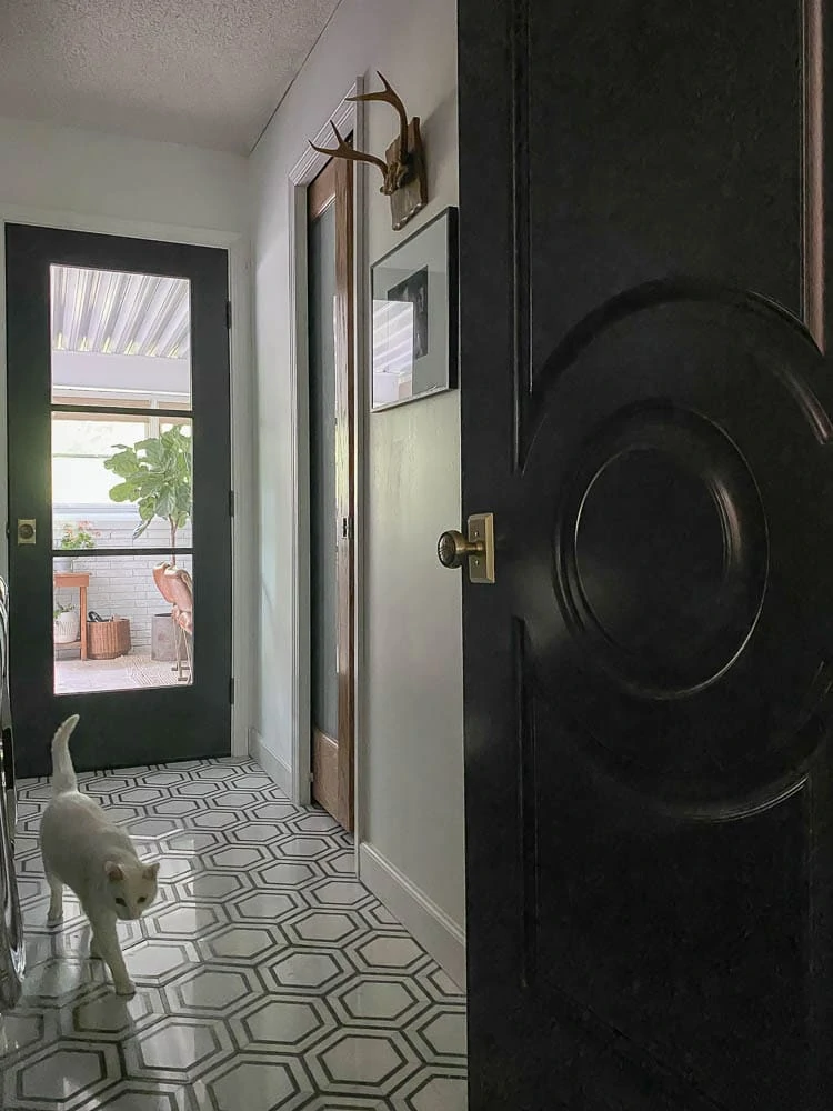 Pocket door for bathroom by laundry room hallway