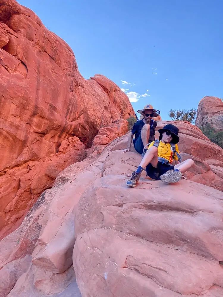 Showing family with kid hiking the fin 